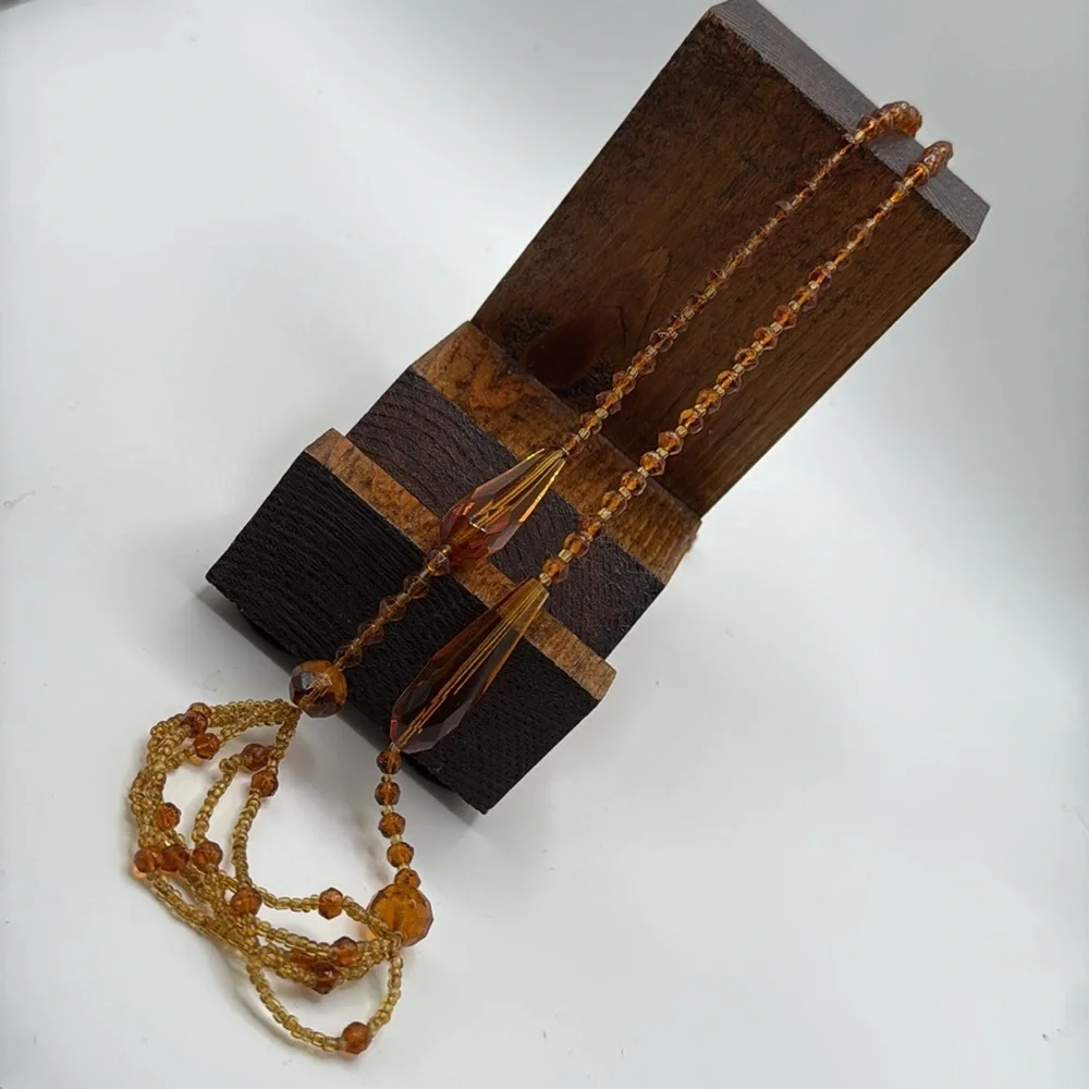 Pretty long amber/ brown colored beaded necklace boho hippie western